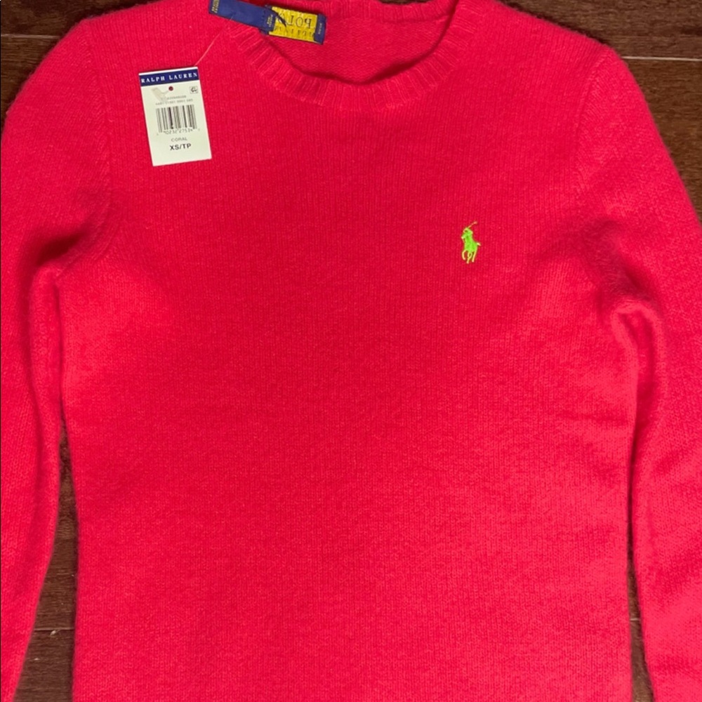 A red polo sweater